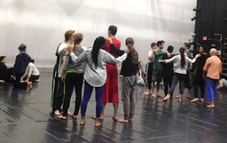 Doug Varone and Purchase College students rehearse in the shelter of the fold