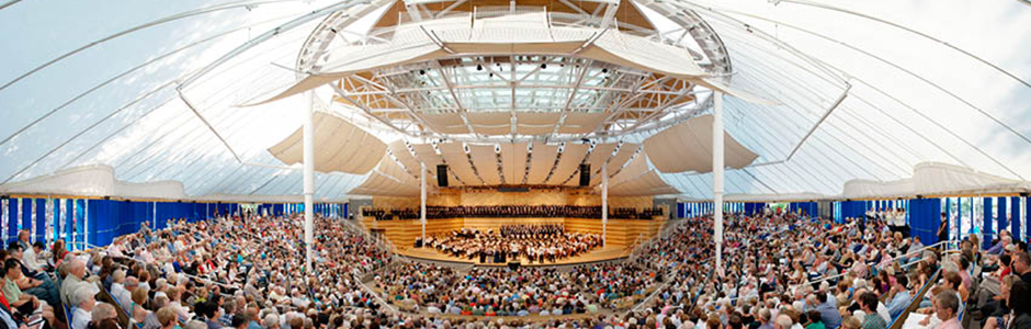 Aspen Music Festival tent with crowd and orchestra