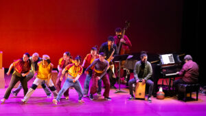 Ephrat Asherie dancers and Arturo O'Farrill on stage performing Shadow Cities