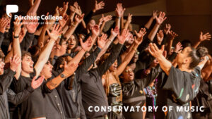 Soul Voices choir singing with arms outstretched