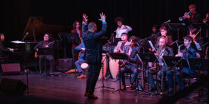 SUNY Purchase Latin Jazz orchestra performing on stage
